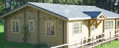 Lillehammer Log Cabin timber framed building for use as a log home or garden office. This log home meets dwelling regulation requirements.