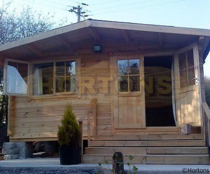 35mm Dunstable 5m x 5m Log Cabin - Click Image to Close